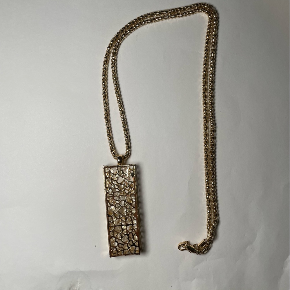Intricate Gold Pendent With Gems Inside Necklace